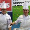 Culinary arts and systems majors Brianna E. Bucklin (left), of Whitehall, and Victoria L. Zablocky, of Jersey Shore, serve vegetable-filled hush puppies and slaw to audience members.