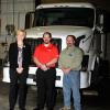 Gathered near a newly acquired Volvo truck are (from left) Elizabeth A. Biddle, Penn College’s director of corporate relations; alumnus Greg A. Moser, who, as a district fleet maintenance manager for FedEx Freight, arranged donation of the 2006 vehicle; and Mark E. Sones, a diesel equipment technology faculty member.