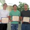 From left, Thomas P. Veres, of Scarsdale, N.Y.; Leonardo Tejeda, of New Rochelle, N.Y.; and Anthony V. Rode, of Lords Valley; hold their certificates outside Penn College's administrative offices.