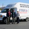 Brent M. Fish (center), president of Fish Real Estate, delivers a box truck to Don J. Luke, director of facilities operations at Penn College, and Loni N. Kline, vice president for institutional advancement.