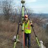 Glenn C. Johnson, a first-year surveying technology major from Sweet Valley, sets up a GPS receiver on an NGS benchmark along Route 15 south of Williamsport. (Photo provided)