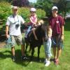 Faculty Member Helps Center's Youngsters Observe 'Pony Day'