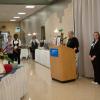 President Davie Jane Gilmour introduces student representative Julie H. Carr (right), recipient of the Student Leader Legacy Scholarship.