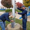 Busy 'Bee' Helps Dad's College Co-Workers Raise Flag