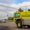 Jets of water shoot from airport-owned apparatus.