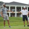 Jeremy Poincenot discusses with Penn College Golf Classic participants how blind golf provides many opportunities, including treasured time with his father, Lio (at right).