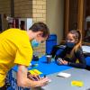 Student-athletes Alexander S. Cassada (soccer) and Hannah Burnett (volleyball) were on hand outside the Keystone Dining Room on Wednesday, collecting messages of hope at a "Crafternoon" table. Burnett, of Middlebury Center, is a physician assistant studies major; Cassada, of Chambersburg, is enrolled in network administration and engineering technology.