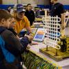 The Penn College student chapter of the American Society of Heating, Refrigerating and Air Conditioning Engineers displays condensor coils in the Field House.