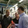 Yokitis and Hart discuss quality issues with Kevin Jant, senior manufacturing engineer.