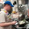 Penn College student Jonathan T. Hall, also an assistant cook for Dining Services at the college, prepares a stir-fry dish in the Capitol Eatery dining unit. Hall, a full-time applied management major from Williamsport, received the National Association of College & University Food Services Mid-Atlantic Region’s Nancy W. Carrier Scholarship for 2016.