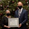 Kevin L. Imes, of Palmyra, recipient of Pennsylvania College of Technology’s Distinguished Alumni Award, displays the honor with President Davie Jane Gilmour. Imes is construction project manager at Penn Medicine Lancaster General Health.  