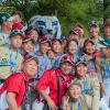 The Asia-Pacific and Japan teams gather around the Wildcat.