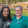 Kavitha R. Kolangaden and Jaclyn L. Casey, who graduated from Pennsylvania College of Technology with degrees in physician assistant in 2018, volunteer at the 2017 Little League Baseball World Series. Thirty-two Penn College students pursuing careers as paramedics and physician assistants will help provide health care at the 2019 LLWS.