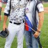 Penn College’s Justus K. Leimbach, a student in business administration: marketing concentration and an All-American member of the college’s archery team, poses with the Lancaster Barnstormers’ Pete Andrelczyk, who twice caught Leimbach’s first “pitch,” a soft-tipped arrow shot from the pitcher’s mound. Leimbach, of Westminster, Maryland, threw out the pitch as part of a community relations project for Lancaster Archery supply, where he is a marketing intern this summer. 