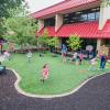 Children enjoy the outdoor play space at Pennsylvania College of Technology’s Dunham Children’s Learning Center. The center recently received continued accreditation from the National Association for the Education of Young Children. 