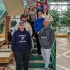 Nursing students who offered a series of employee wellness sessions line the Breuder Advanced Technology & Health Sciences Center atrium staircase.