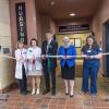 Cutting the “ribbon” to dedicate the Penn College Nursing Education Center are, from left, Dottie M. Mathers, associate professor of medical-surgical nursing; Sandra L. Richmond, director of nursing; Edward A. Henninger, dean of health sciences; President Davie Jane Gilmour; and student Monica A. Flexer, president of the Penn College Student Nurses Association.