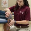 Pennsylvania College of Technology’s physical therapist assistant program received accreditation from the Commission on Accreditation in Physical Therapy Education. Taylor M. Lockerby, a member of the college’s first graduating class in August, takes a goniometric measurement of knee flexion.