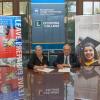 Pennsylvania College of Technology President Davie Jane Gilmour and Lycoming College President Kent Trachte sign a tuition exchange agreement at the Williamsport/Lycoming Chamber of Commerce offices.