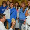 Justin M. Ingram, assistant professor of biology at Penn College, center, shares scientific insights with Tioga County eighth graders at the STEM Awareness Career Day. 