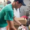 Pennsylvania College of Technology culinary arts and systems student Randall Colby Janowitz, of Westminster, Maryland, works in the kitchen of one of Phillips Seafood’s Ocean City, Maryland, restaurants. Janowitz is completing his second internship with the company, which hired 15 interns from Penn College’s hospitality majors this summer.