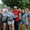 A pennant-worthy group of campus volunteers shares a memorable moment with a Hall of Famer.