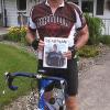 Carrying a photo of his inspiration, Ronald E. Kodish prepares for a 400-mile bicycle ride across Pennsylvania. (Photo by Teresa Kodish)