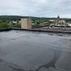 Roof repairs were completed last month at the Community Arts Center, seen in this photo looking to the northeast from West Fourth Street.