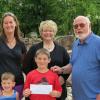 Front row, from left: Landon and Griffin English (sons of Ryan and Karen English). Back row, from left: Heather English (Ryan’s sister); Debra M. Miller, director of corporate relations at Penn College;  and Joe English (Ryan’s father). Not pictured: a third son, Cullen McWhorter.