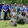 Penn College team members proudly surround their car during Baja SAE in Mechanicsville, Md. Penn College competed against 96 other teams from the United States and eight other countries.