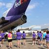 Participants in SMART Girls at Pennsylvania College of Technology prepare to explore a retired FedEx Boeing 727 now used for instructional purposes at the college’s Lumley Aviation Center.