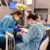 Pennsylvania College of Technology dental hygiene students Abigail S. Way, ’17, of Williamsport, and Rebekah L. Caretti, ’18, of Weedville, provide free preventive dental services to a child during the 2017 Sealant Saturday event at Pennsylvania College of Technology. Volunteer dentists, dental hygienists and dental hygiene students will again provide free services in the Penn College Dental Hygiene Clinic during Sealant Saturday on March 2.