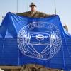 College Flag Brings Welcome Touch of Home to Alumni Serviceman