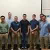 Celebrating their completion of short-term roustabout training are (from left) Weston A. Bushyeager, Coleman R. Wolfe, Nur Hafid Mohadi, Zachary D. Nowicki, Garrett P. Zola, Brendan M. Carothers, Brad S. Fuller, Keith P. Bates, Matthew Diaz and George A. Rippel.