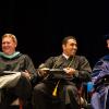 At a Pennsylvania College of Technology commencement ceremony, Elliot Strickland (left) and Carolyn R. Strickland, flank student speaker Hashim Abbas Alfulful. The Stricklands are boosting support for their efforts to enhance diversity and further develop student leadership opportunities at the institution.