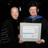 Excellence in Teaching Award winner Daniel K. Christopher with Pennsylvania College of Technology President Davie Jane Gilmour.