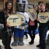 Students join the Penn College Wildcat in the “One Tray at a Time” benefit, during which the campus community loaded vintage cafeteria trays with nonperishables for The Cupboard. From left are Perry R. Leslie Wheat, a graphic design major from Millheim; Jordan M. Scott, of Cogan Station, enrolled in residential construction technology and management: building construction technology concentration; and Kory J. Zielinski, a manufacturing engineering technology student from Honesdale.