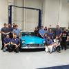 Students and instructor Roy H. Klinger (second from left at rear) surround the Thunderbird in Penn College’s automotive restoration lab.