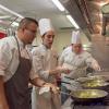 Uribe and students Kobi A. Shannon, of Lewistown, and Aaron Timmons, of Greencastle, prepare Romanesco for the main course.