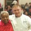 Barbara Voss, a leading member of the Antioch congregation, shares an appreciative smile with Mark J. Kriner Jr.