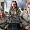 The all-female team from Penn College that participated in a welding fabrication competition at the SkillsUSA National Championships, shows the rocket stove they built during the event. The stove will be donated to a family in the developing world by WaterStep. From left are Joelle E. Perelli, of Bath; Natalie J. Rhoades, of Weedville; and Erin M. Beaver, of Winfield. 